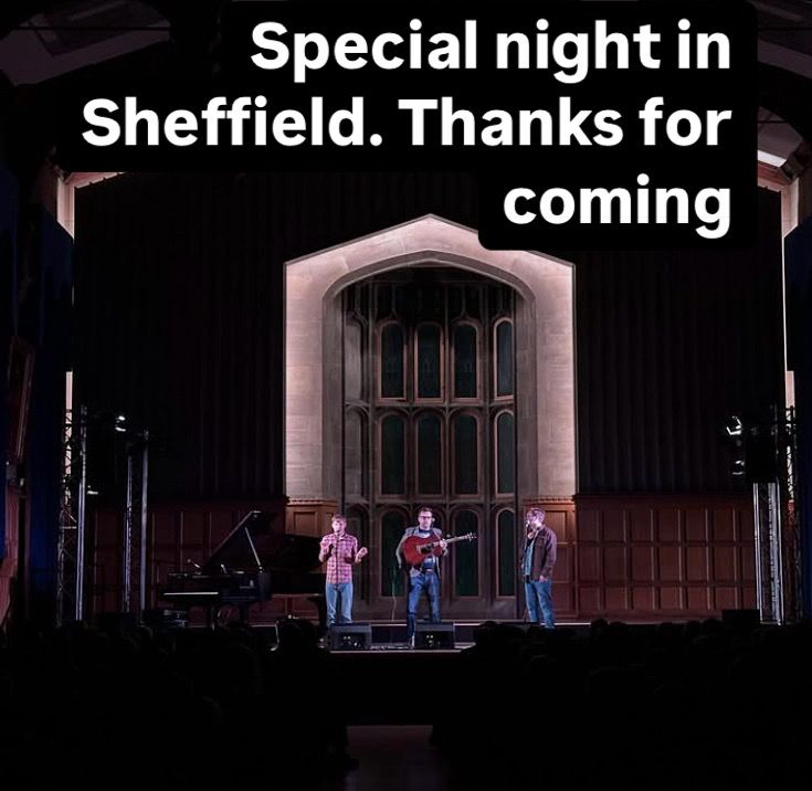 Three band members on stage 