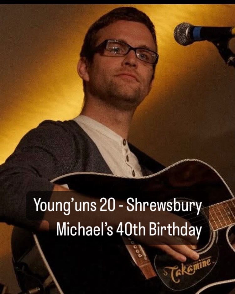 Young Michael with guitar 