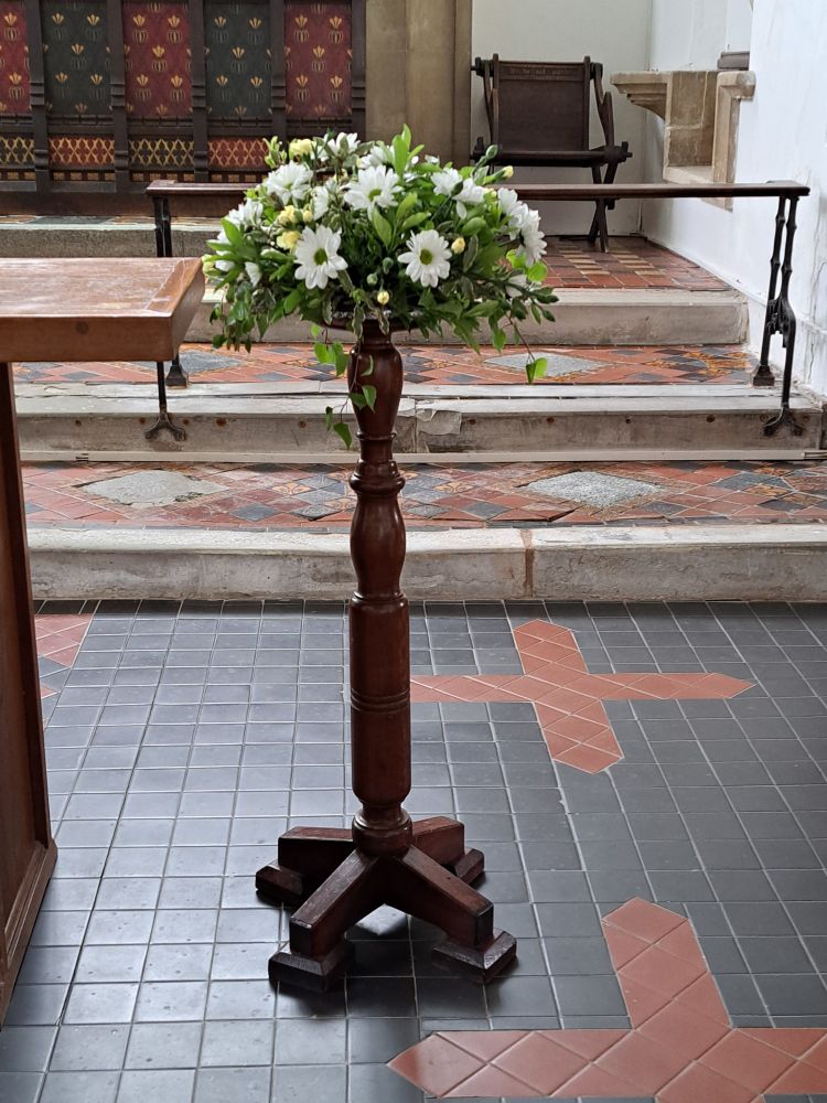Paschal candle stand.