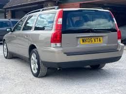 Rear three-quarter angle of a champagne gold 2005 Volvo V70