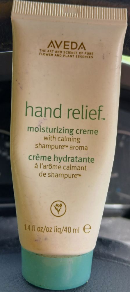 Small tube of Aveda hand cream. It is called 'Hand Relief'.
