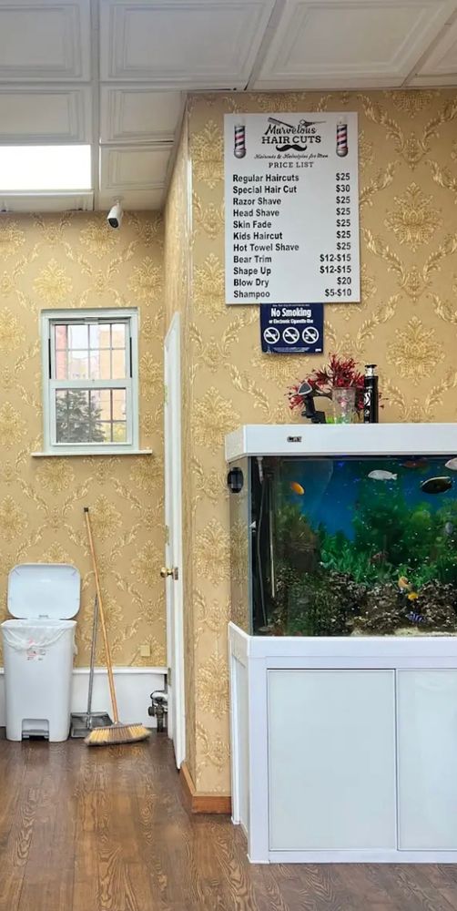 A barber shop price list offering, amongst other things, a “special haircut” and a “bear trim.”