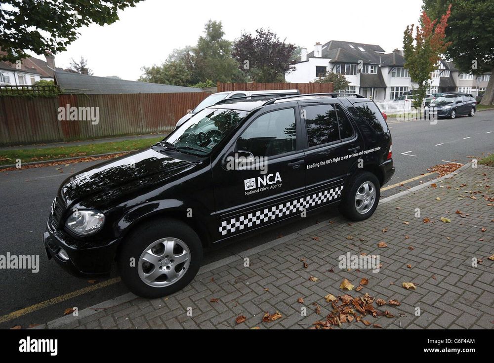 the saddest car in all the world. a very school run type black Mercedes 4x4, complete with roof rack, with an NCA logo on the front door, a vintage 2010s ‘here’s what a police service is’ mission statement/wordmark that starts on the back door and goes on for so long it hangs over the rear axle, and a band of silitoe tartan on the bottom. it’s parked on the pavement of a suburban street and it is giving me depression