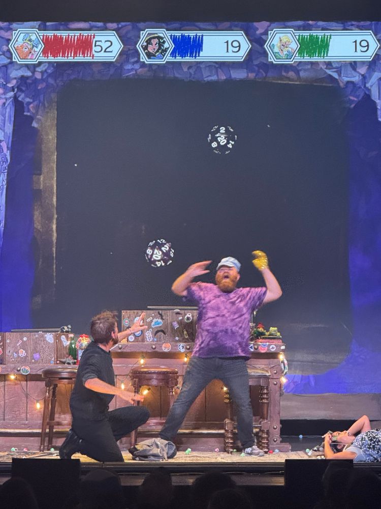 A DM triumphs! Twenty-sided Tavern performance featuring two natural d20s rolled with disadvantage 