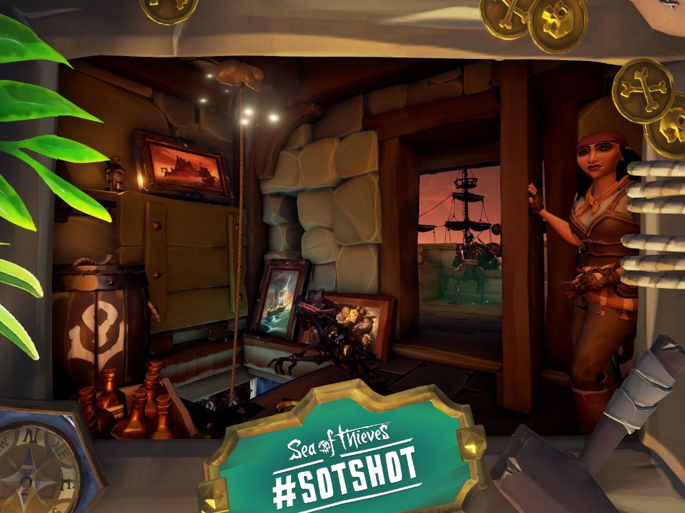 A framed screenshot of Sea of Thieves showing a pirate hiding behind a door with their loot as a ship sits outside. An open grate in the floor is seemingly being used to move the loot without being detected.