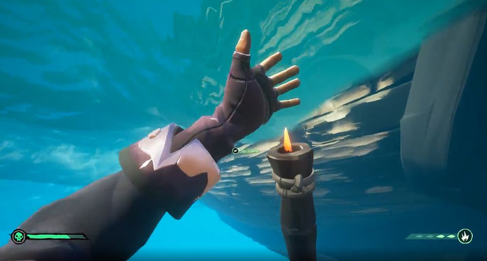 A screenshot of Sea of Thieves showing a player approaching a ship from underwater while reloading a blowpipe.