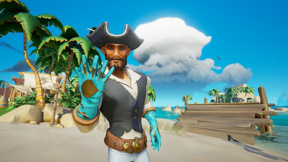 A pirate holds his hand up for you to marvel at his gloves, which are an arresting blue with impressive gold accents.