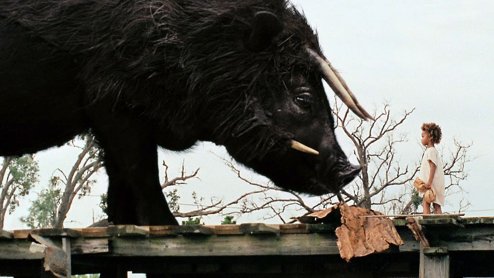 Hushpuppy and one of the beasts, 