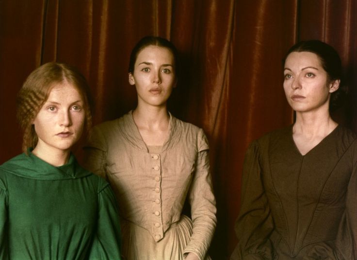 Isabelle Huppert, Isabelle Adjani and Marie-France Pisier looking lugubrious in period costume.