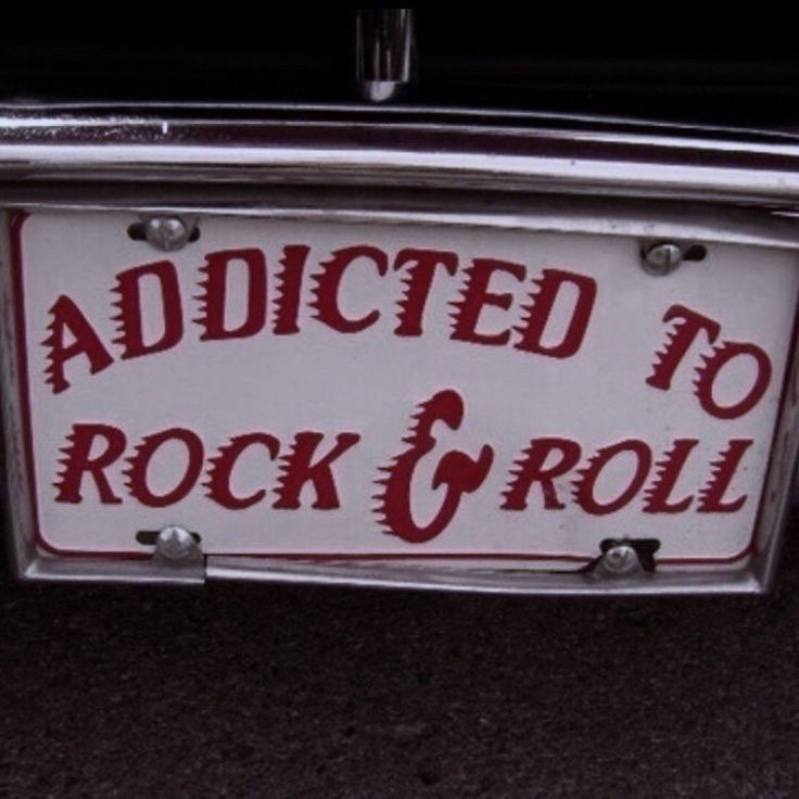 Addicted to rock & roll sign