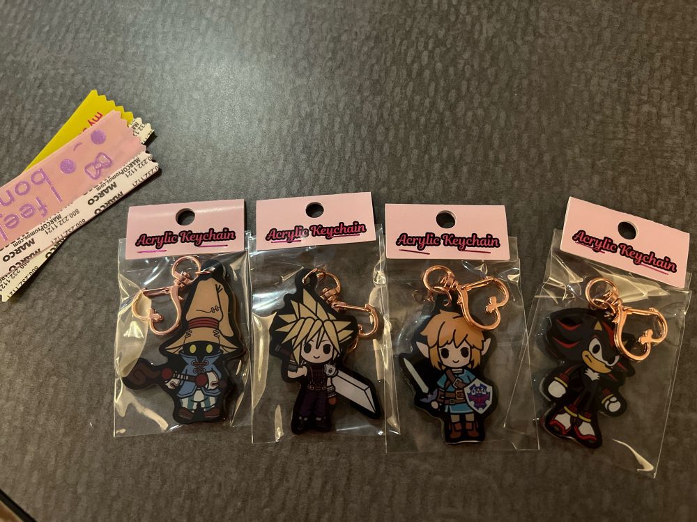 Beautiful acrylic keychains from left to right, Vivi from FFX, Cloud from FFVII, Link from BOTW, and Shadow the Hedgehog