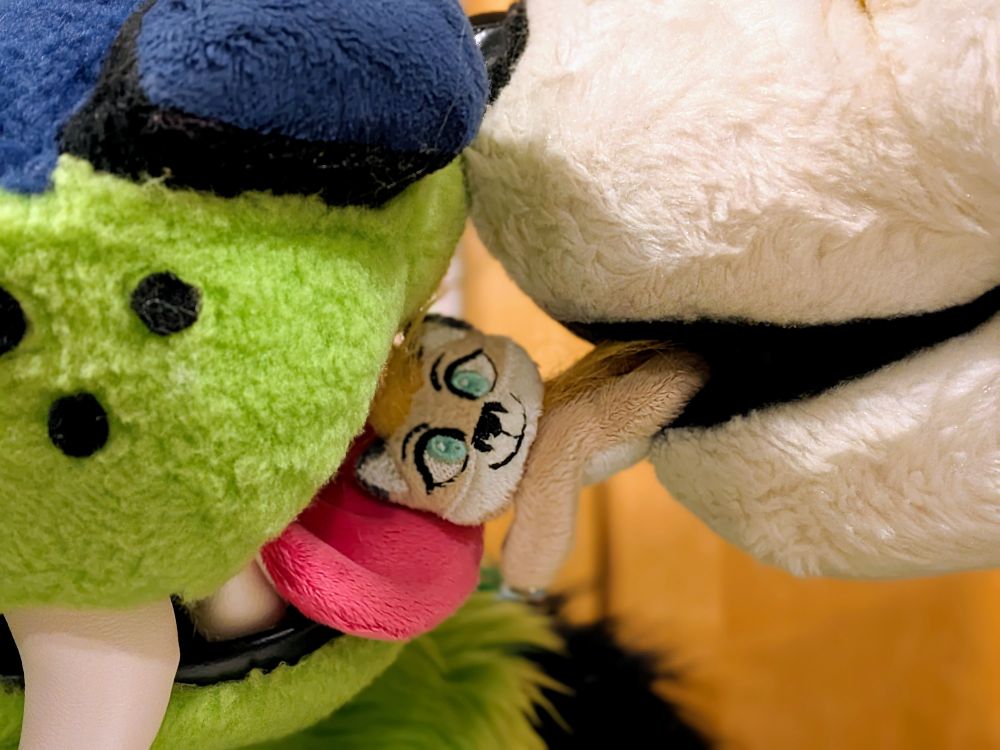 miniLatte getting slurped by Seth and Boulder. Yes it's weird.