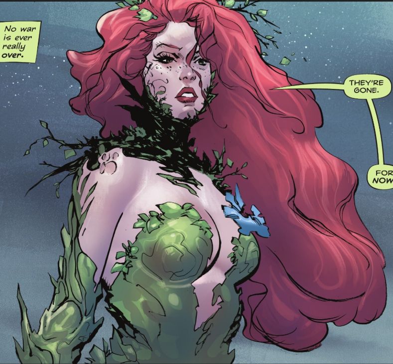 Poison Ivy standing with a soft gaze just past the viewer, she looks very pretty