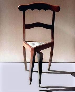 A chair with its legs crossed looking hella CUNT
