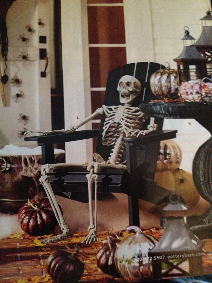 skeleton sitting in a chair