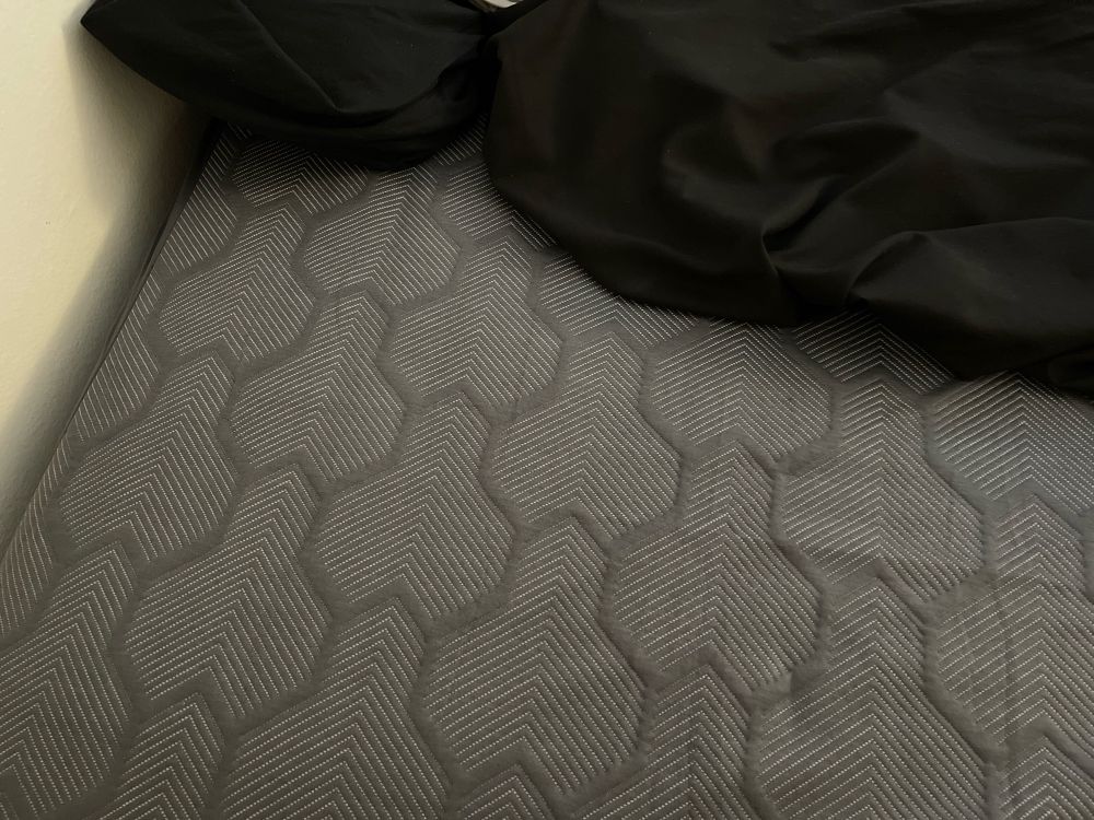 mattress cover covered in chodes