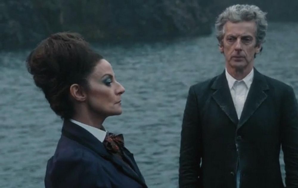 Its a color screencap or photo of Peter Capaldi and Michelle Gomez as the 12th Doctor Who and Missy aka the Master it's from the episode "Extremis" is the sixth episode of the tenth series of the British science fiction television series Doctor Who. It was written by Steven Moffat and broadcast on 20 May 2017 on BBC One. "Extremis" received very positive reviews from television critics, with many praising Peter Capaldi's performance and Steven Moffat's script"
