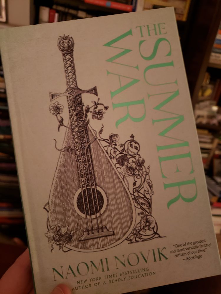 The cover of The Summer War by Naomi Novik, featuring metallic green title text next to a sketch of a 4-stringed lute with a sword hilt as its neck and vining flowers growing around and through it.