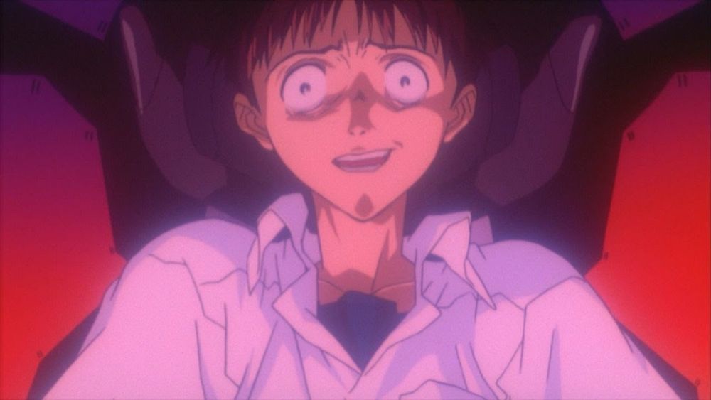 Shinji from the End of Evangelion sitting in Eva-Unit 01 with a disturbed look on his face.