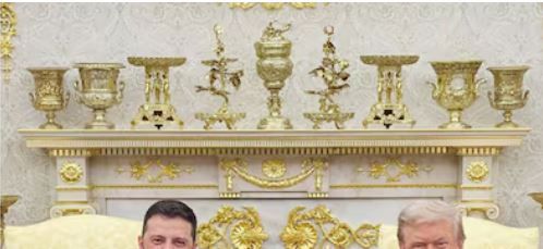 Screenshot of an AP photo of the Oval Office on August 18, 2025, cropped to show that there are still a total of 9 objects on the mantel but the weird clock is gone and there are more urns. The center item is the tallest but overall there is much less height difference across the top-line of the knick-knacks. 