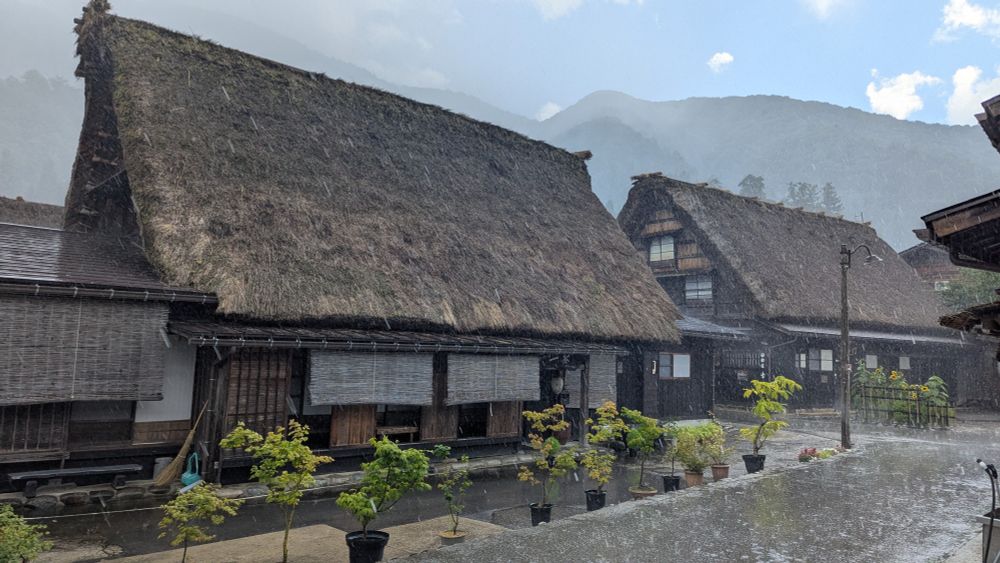 Next to previous photo the door to the outside where it is pouring rain currently. You see the thatched houses this area is known for.