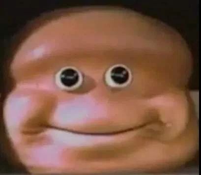 The Almighty Loaf; a puppet made up to look like an anthropomorphic piece of bread.