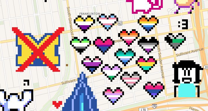 a screenshot of Wplace, showing a bunch of pride flags next to a large michigan logo that's been crossed out.