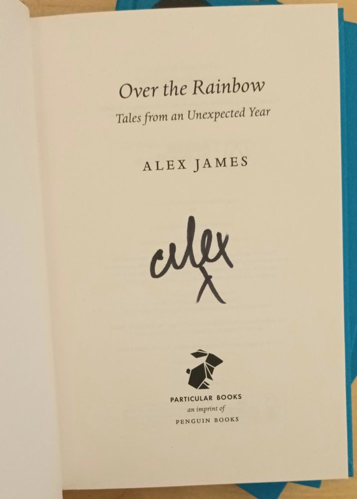 Alex's signature inside the book. 