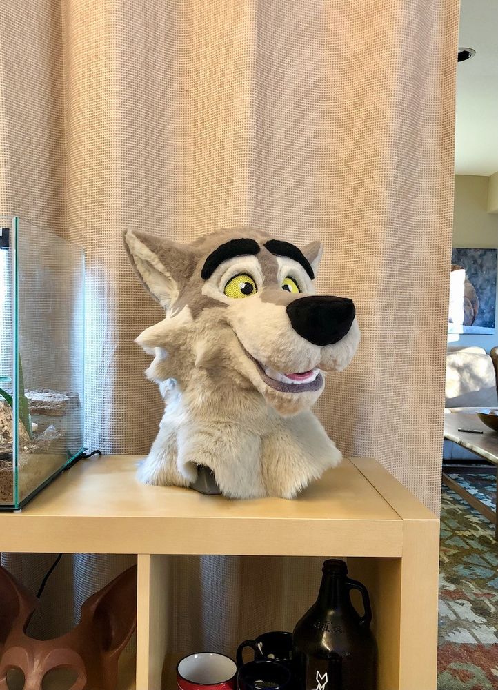 A just-finished fursuit head that looks suspiciously like wendell from fortnite, but is definitely wesley, an entirely unrelated character from the mind of my father. 
