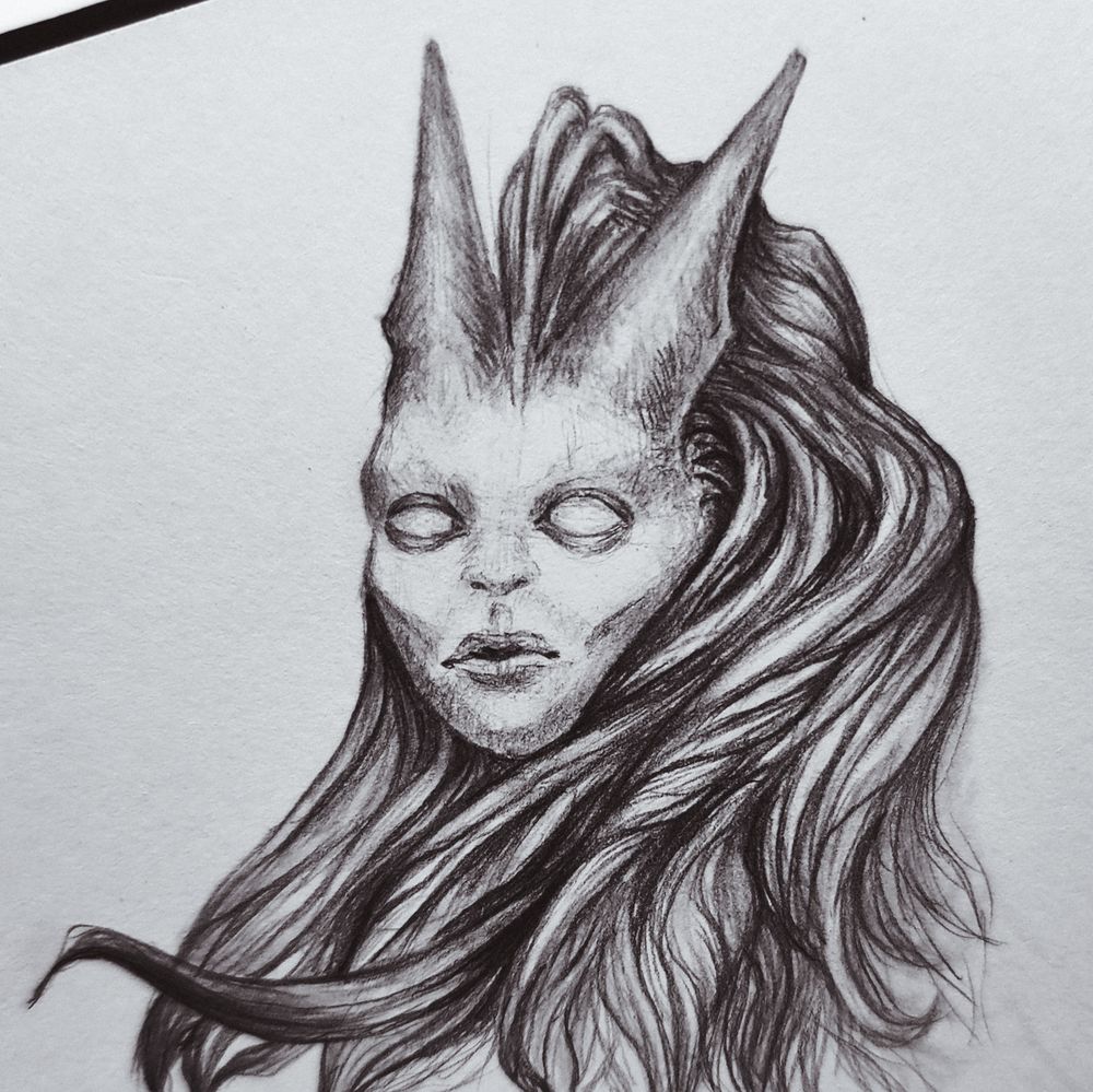 Pencil drawing of an alien character (species: Arka) with big pointy ears and long flowing hair. Her glowing eyes are completely white, with no visible pupil.
In comparison to the newer version, this one has less refined ear and face anatomy. In addition, her hair aren't as natural as in the newer art.