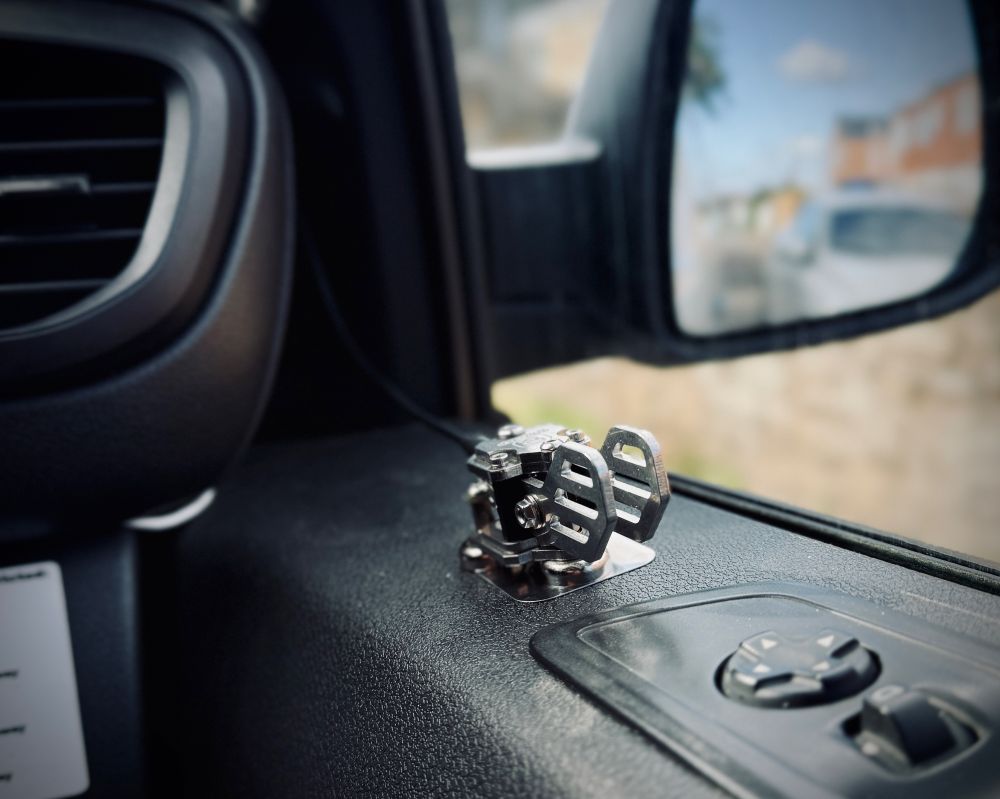 Picture shows an iambic morse key magnetically fastened to the door side in the van