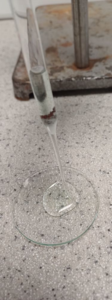Using filter paper in small-scale chem does not work. Filtering the reaction mixture through cotton wool in a Pasteur pipette. Copper particles and bits of iron are separated from the iron(II) sulfate solution..