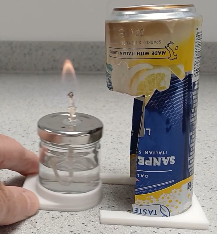 The burner slides into the can.