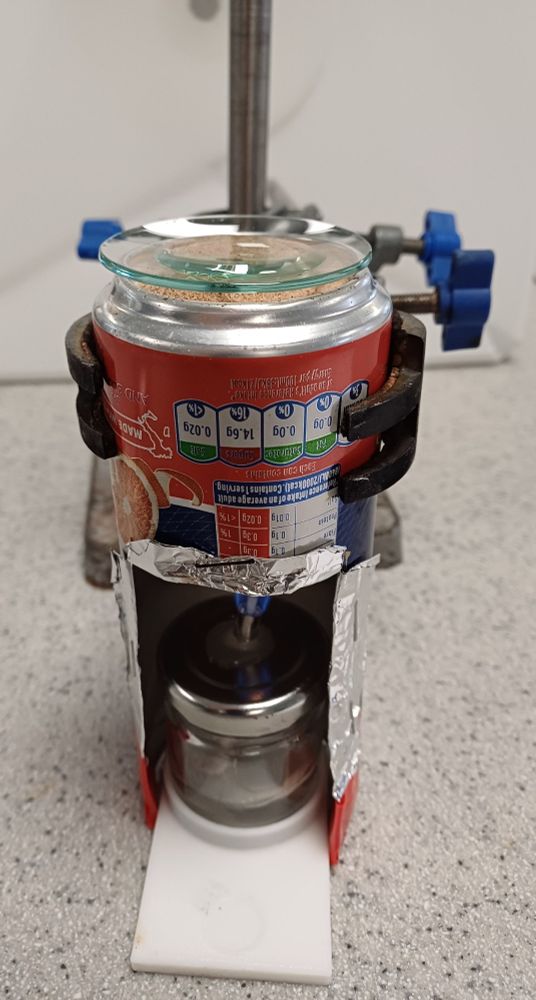 Heating the filtered solution for 10 minutes on my personal spirit-burner, bio-fuel, hotplate.