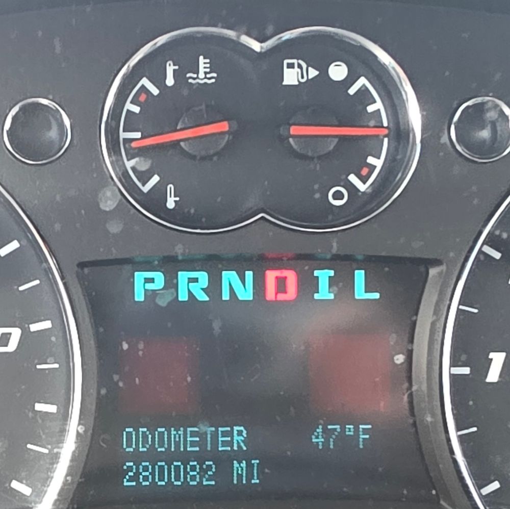 Photo of a car odometer with the mileage at 280082.