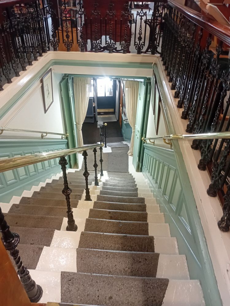 Staircase looking down at the entrance
