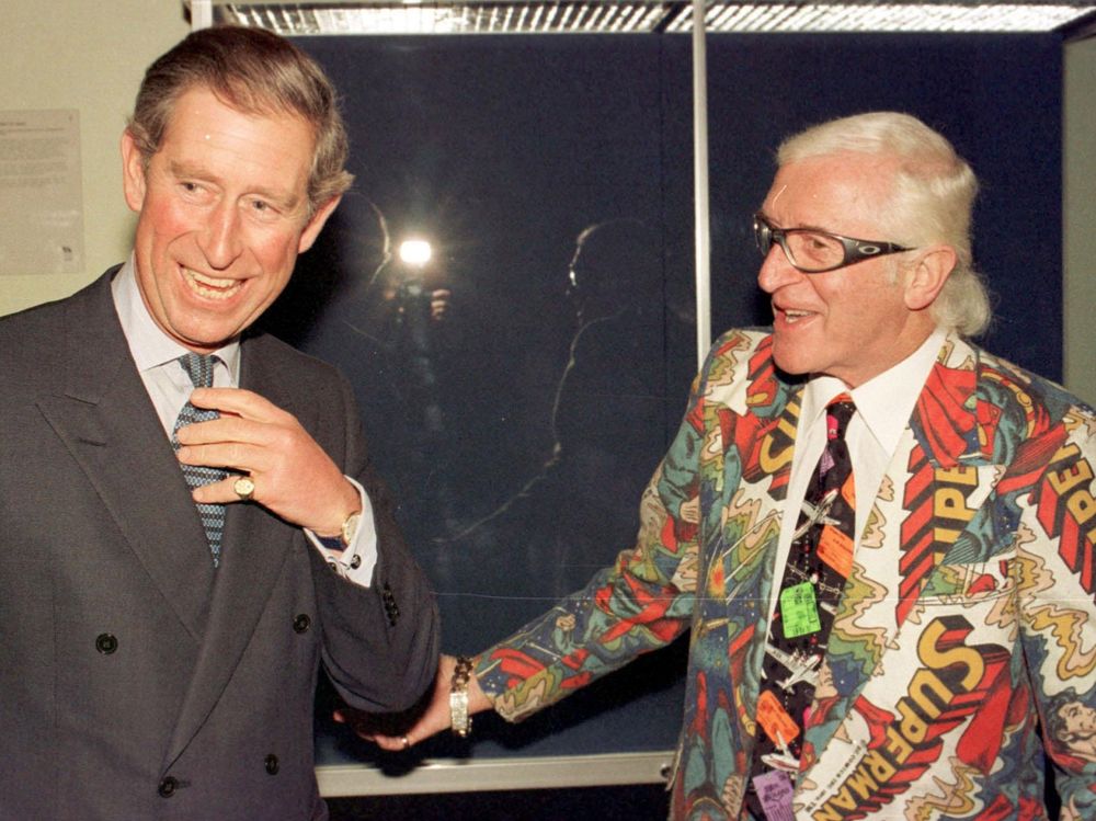 Prince charles laughing uproariously at a joke by his best friend, the terrifying nonce sir Jimmy savile
