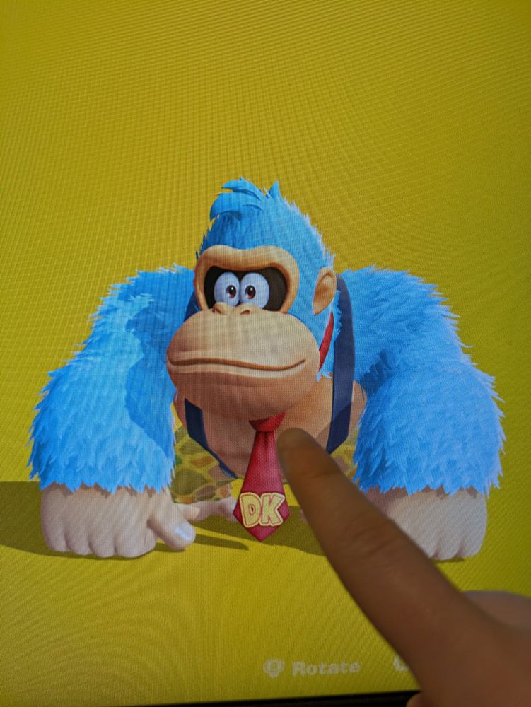 A photo of my monitor showing Donkey Kong with blue fur