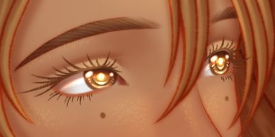 Close up of a set of eyes the are golden in color.