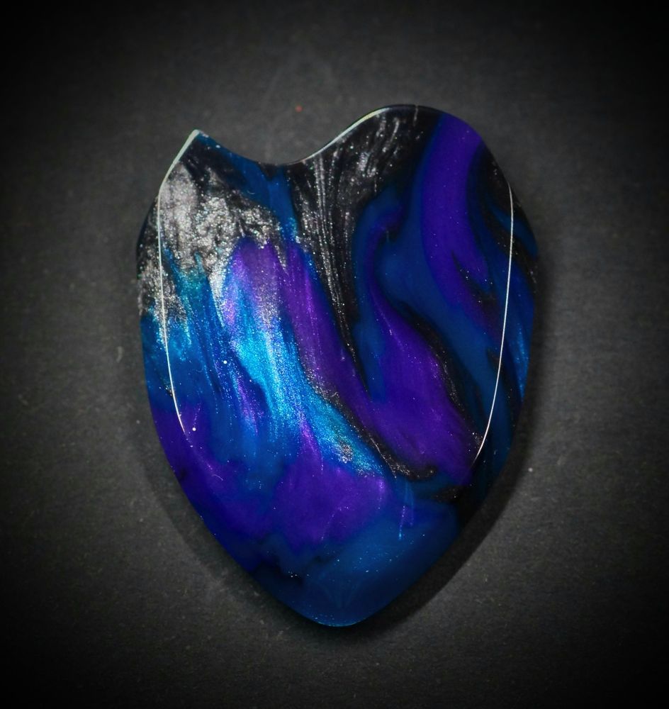 Arcanum Plectra "Paladin" guitar pick.