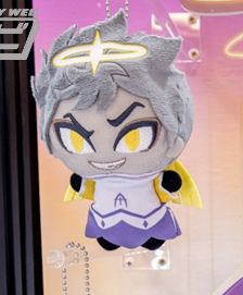 A plushie of Adam from Hazbin Hotel. He's an angel in a white and light purple-blue robes with yellow and white sleeves. He has gold wings, gold eyes, a white halo, pale skin, and gray hair.
