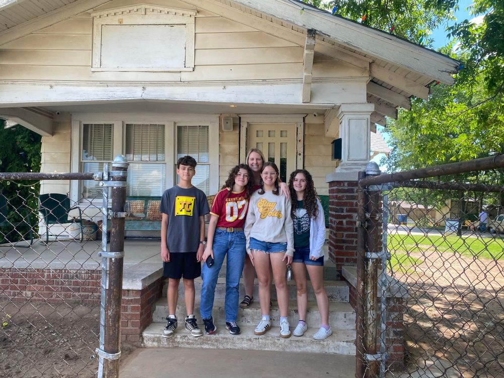 My family outside the house (now museum) in the movie The Outsiders.