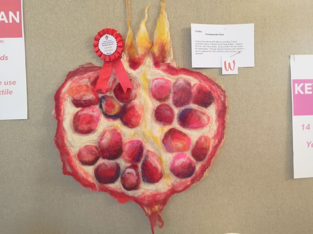 Prize winning piece in textile design competition - felted and stitched pomegranate by Isobel Owen