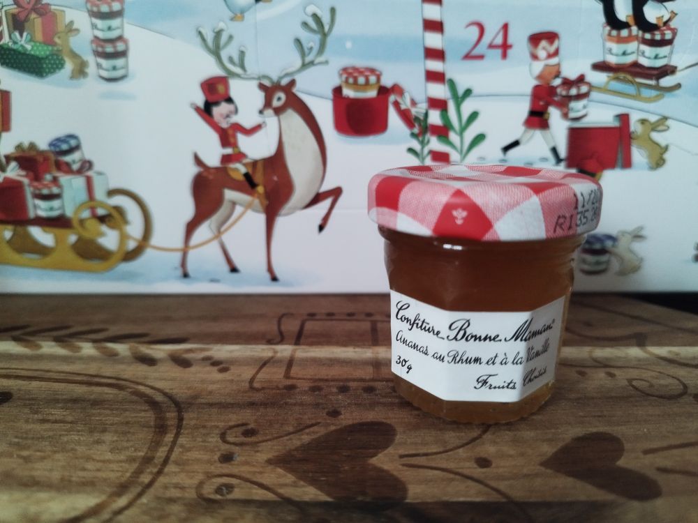 Mini jar of jam in front of Bonne Maman advent calendar