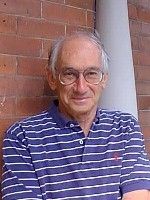 Portrait of Professor Emeritus of Economics Jon Cohen outside Max Gluskin House, Econ HQ at the University of Toronto