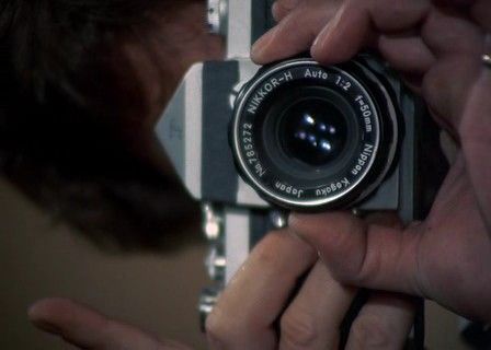 A close up shot where the NIKON logo is covered by black gaffer tape.