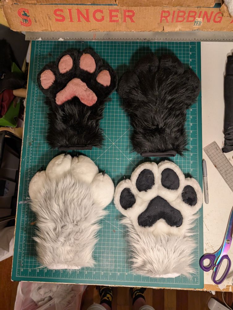 Two pairs of fursuit handpaws