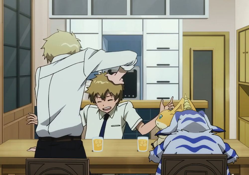 Matt ruffling TK's hair in their kitchen, with Patamon and Gabumon