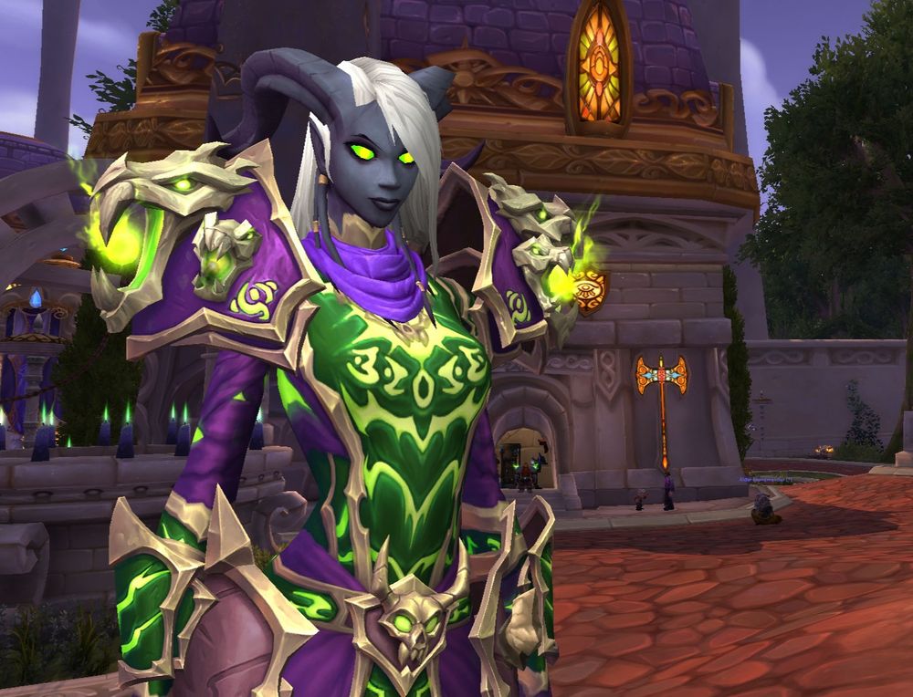 Draenai warlock with dark blue skin green eyes white hair and curved ram horns wearing a vibrant purple and green warlock remake set of the tier 2 set from World of Warcraft adorned with skulls standing in Dalaran 