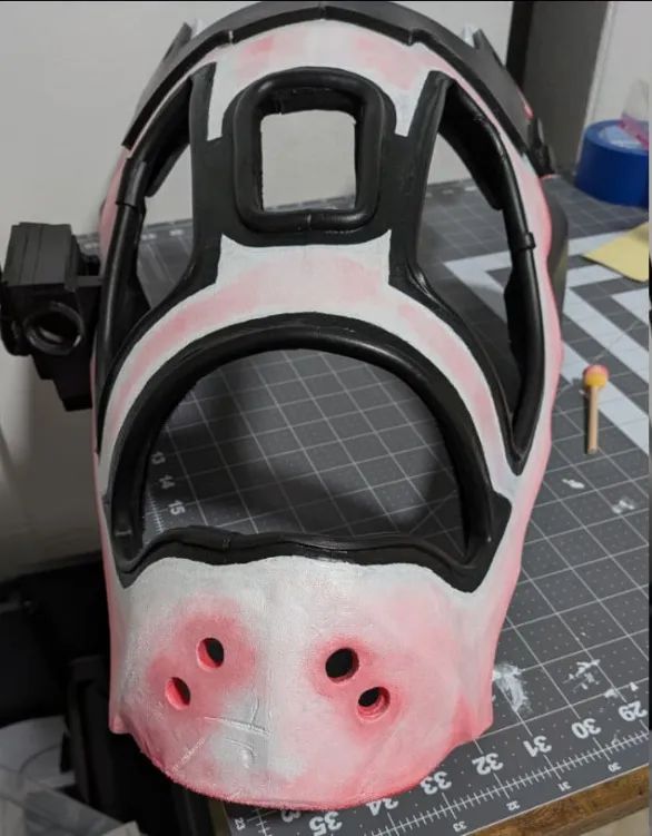 Synth head. Build in progress. Black and white basecoat.  Pink shading around edges for contrast.